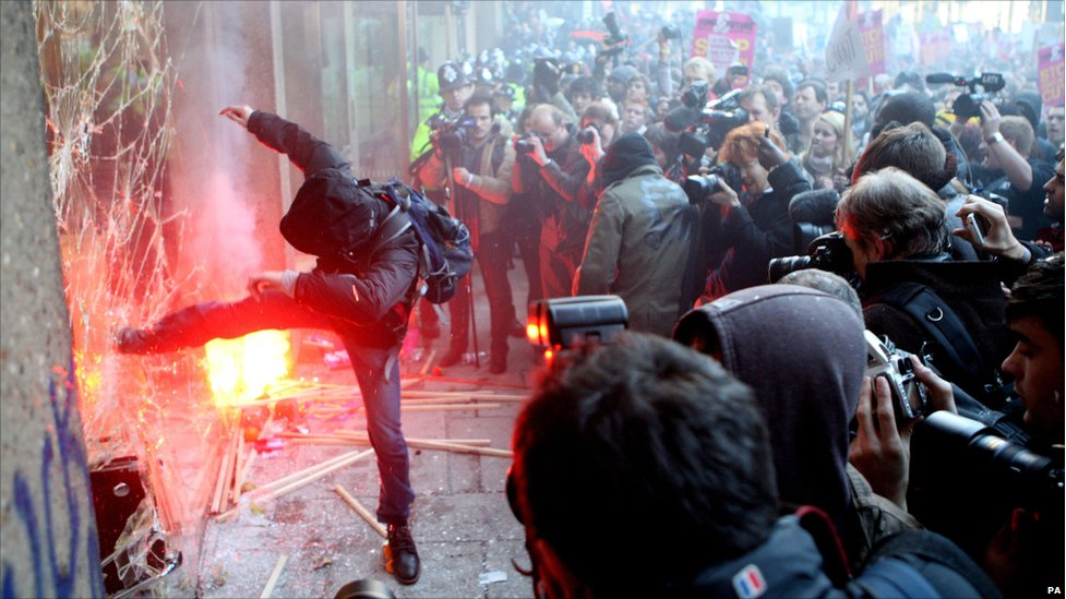 Window smashed during 2010 student protests in London. Image "courtesy" of BBC.