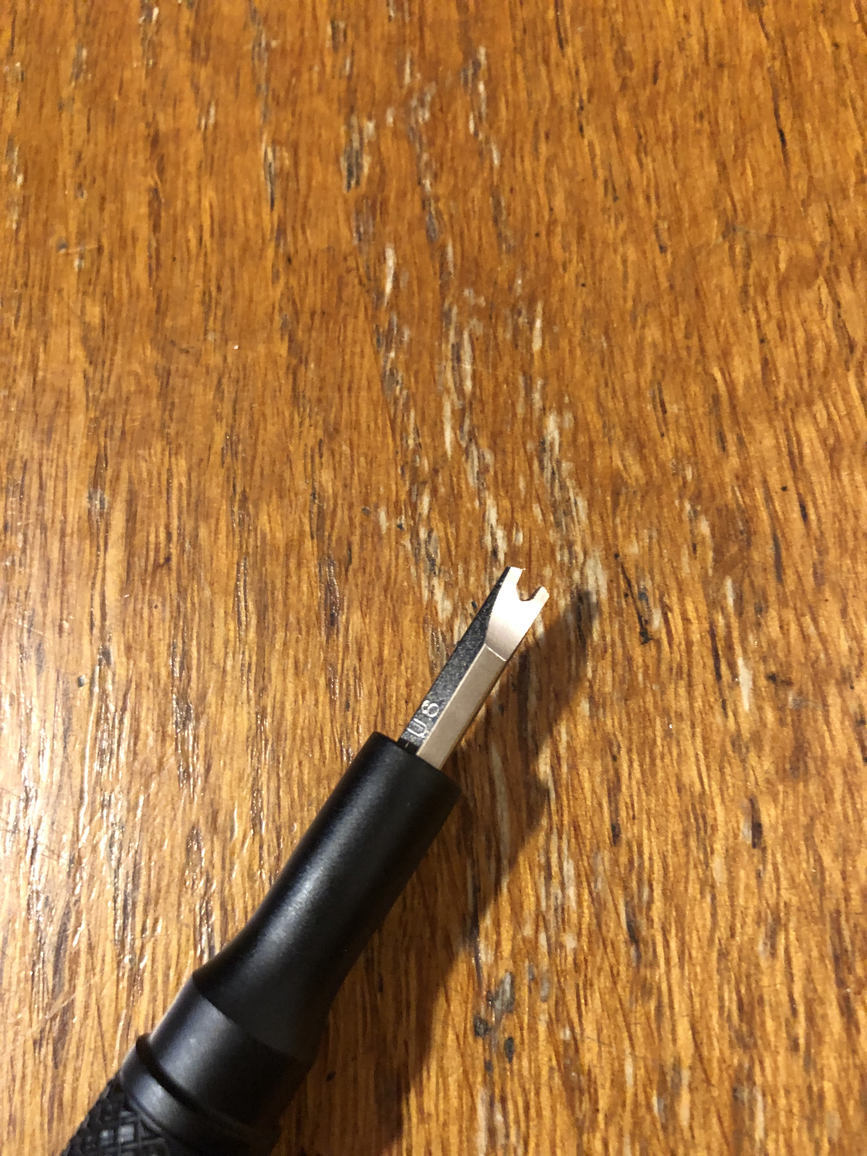 The appropriate bit for the security screw