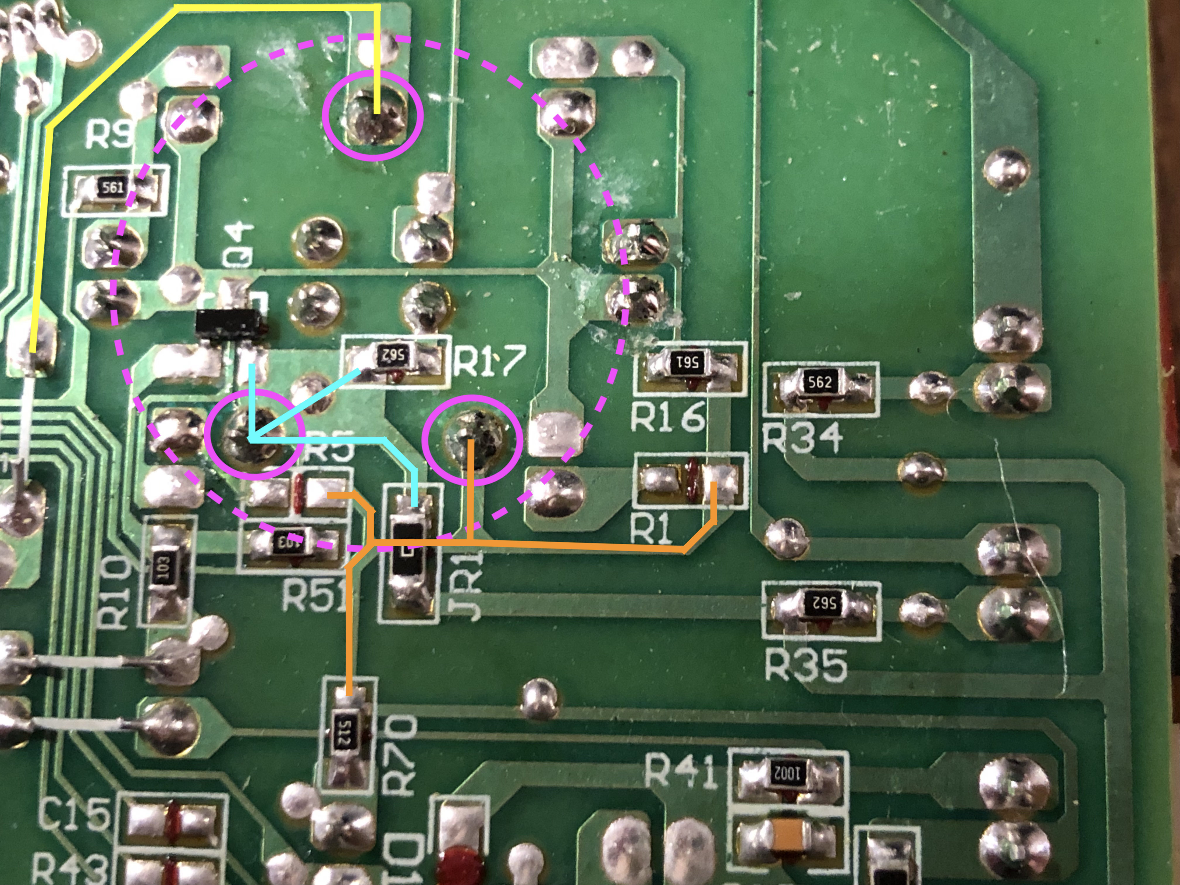 Fragments of the circuit connected to each terminal. Top pin: yellow. Left pin: cyan. Right pin: orange. Printed wires traced in colour