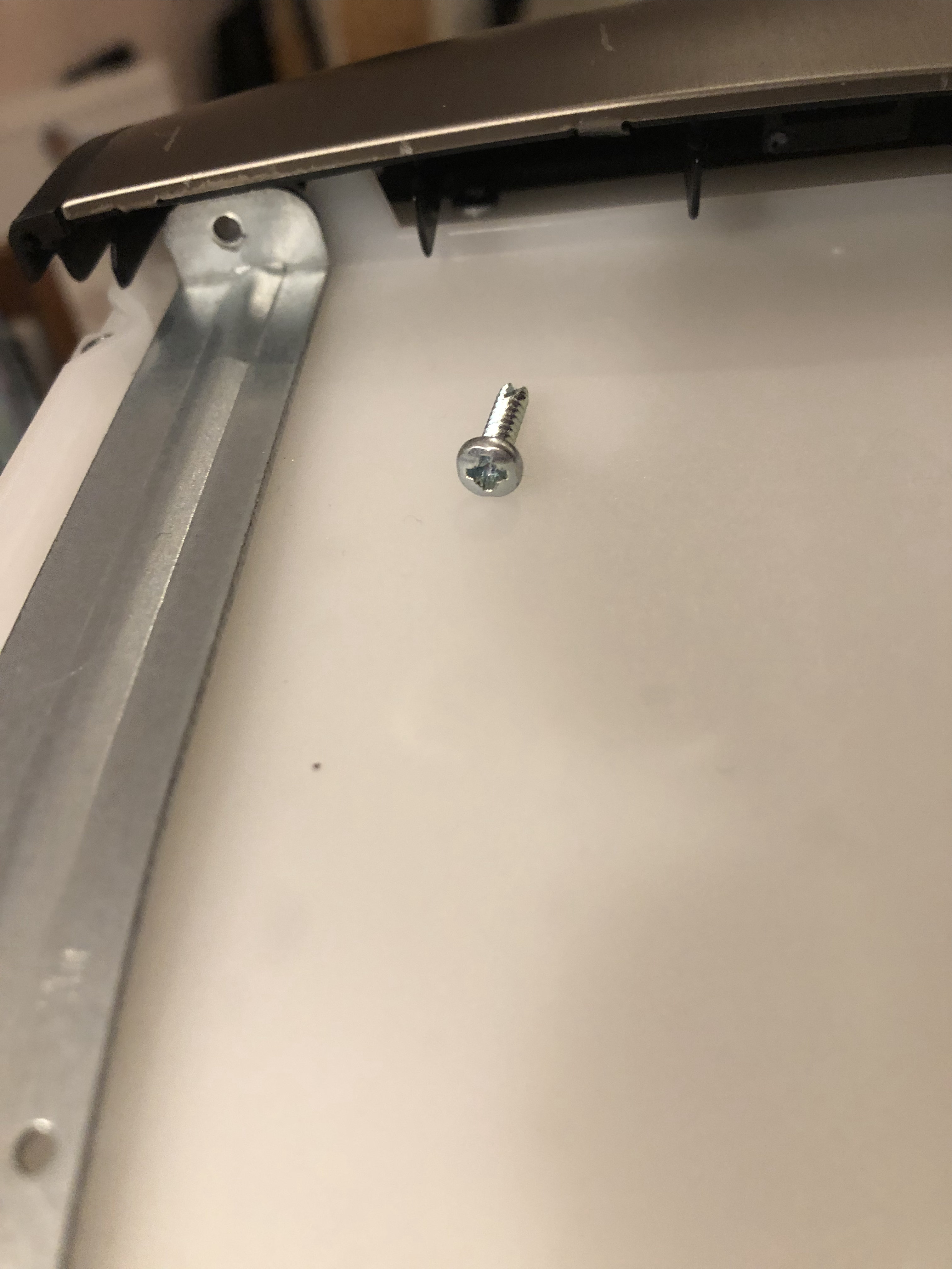 The screws for the tank straps are not pointy at the end, but have a sharp v-shaped notch which feels like it could help them destroy something if you mis-thread them. Don't know what the point of that is. tank strap and screw